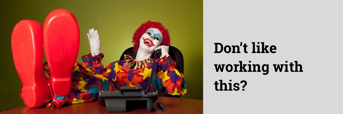 clown with foot on desk